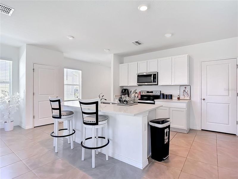 Furnished interior view inside a new home in Westgate at Avalon Park, Wesley Chapel (Image 12). Furnished interior view inside a new home in Westgate at Avalon Park, Wesley Chapel (Image 12).