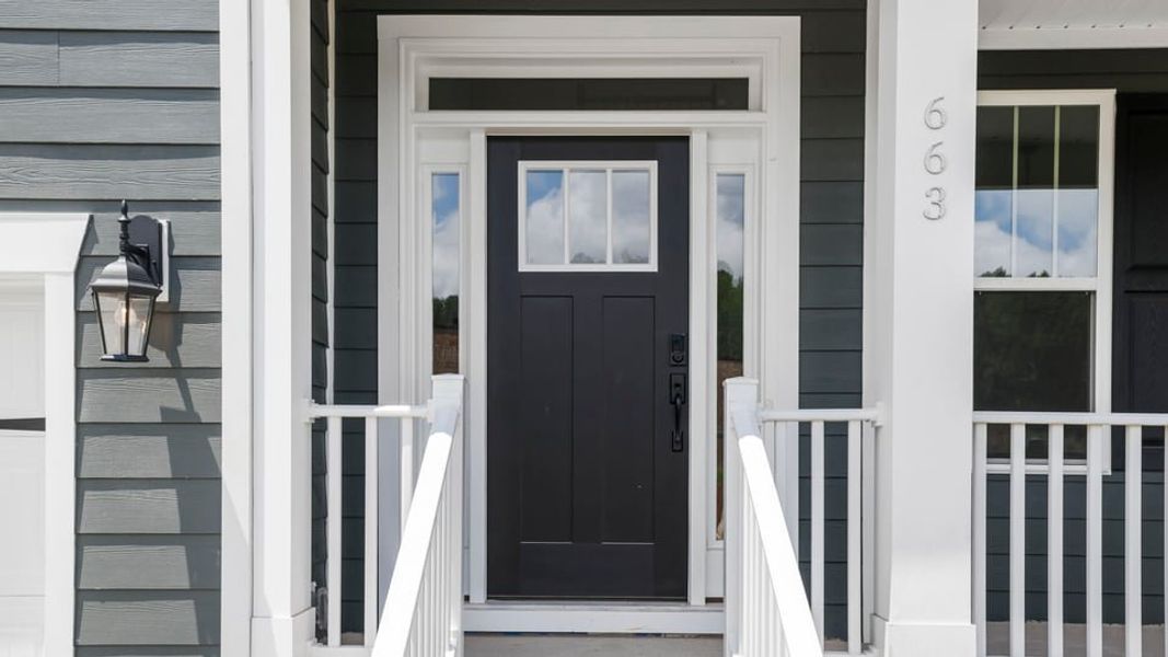 Exterior details and patio area of a home in Sunset Summits, Spartanburg (Image 3).