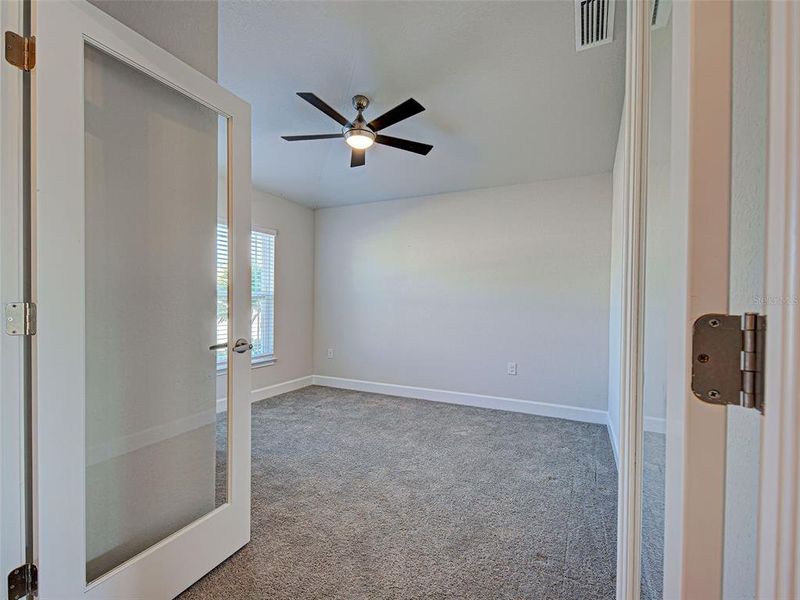 Spacious, unfurnished interior of a new home in Watercress Cove, North Port (Image 38).