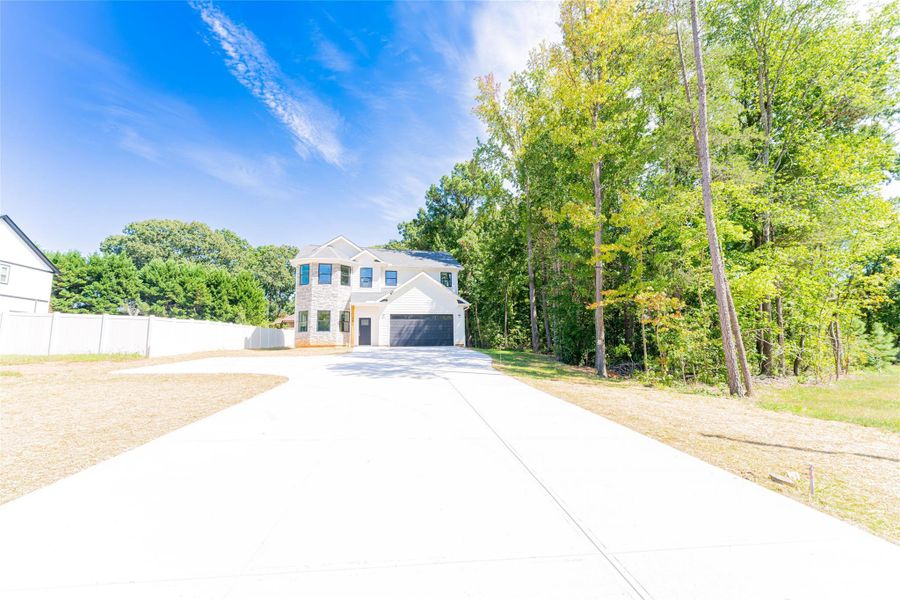 Front exterior of a new home in , Charlotte, NC, highlighting curb appeal (Image 20). Front exterior of a new home in , Charlotte, NC, highlighting curb appeal (Image 20).