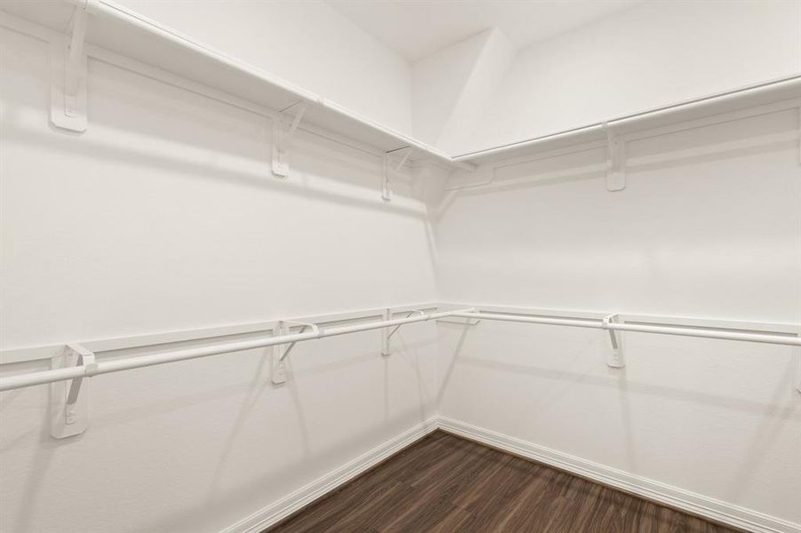 A view of your large primary walk-in Closet