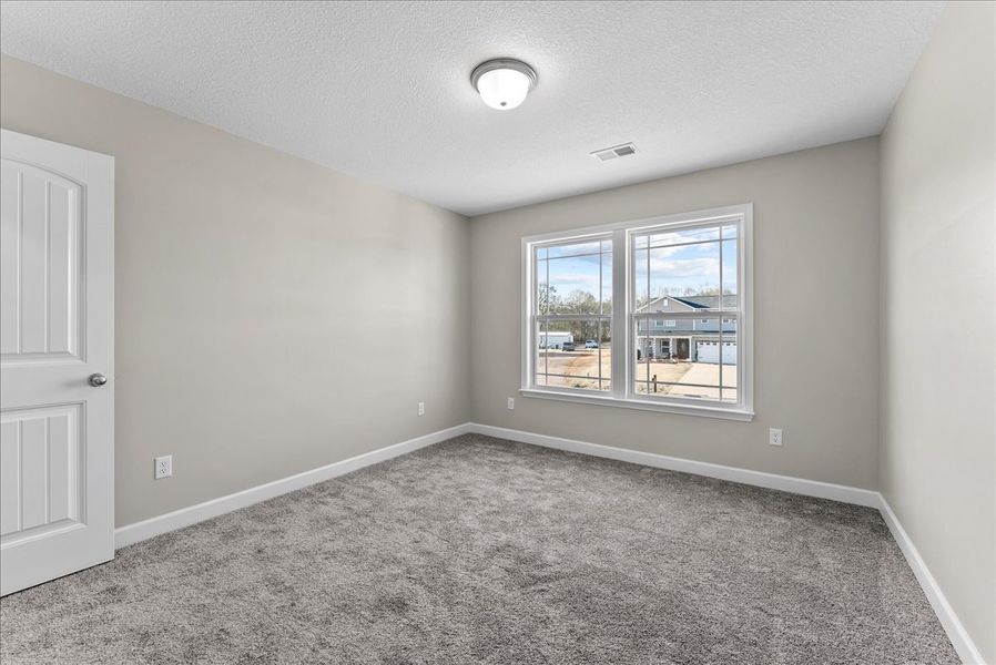 Representative unfurnished interior of a home built from the Sumter by Enchanted Homes in Lonesome Dove, San Antonio (Image 45).