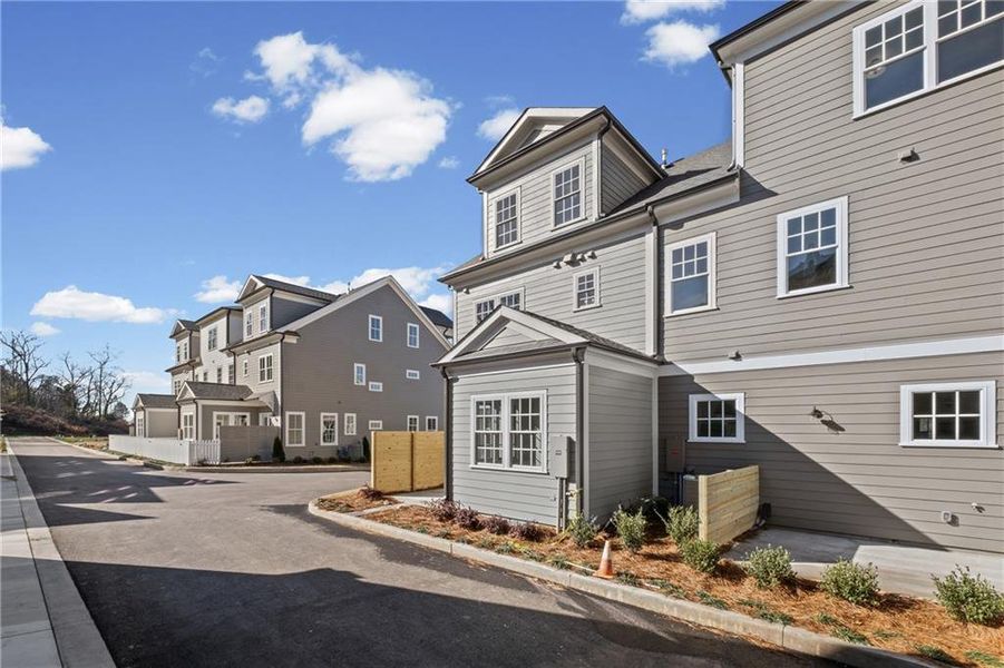 Front exterior of a new home in , Ball Ground, GA, highlighting curb appeal (Image 23).