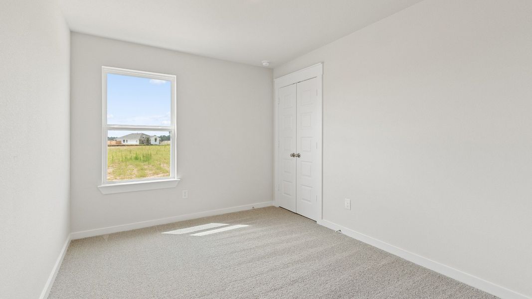 Representative furnished interior of a home built from the Avalon by Brightland Homes in Cielo, Conroe (Image 12).