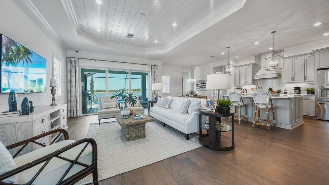 Representative furnished interior of a home built from the Bright Meadow 2 by Neal Communities in SkySail, Naples (Image 10).