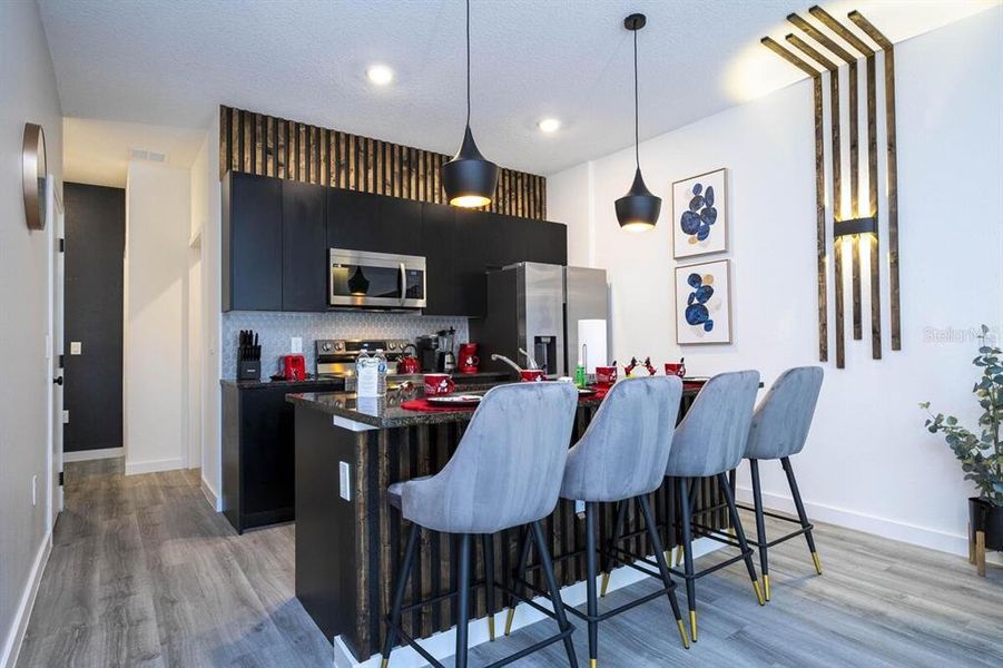 Furnished interior view inside a new home in , Kissimmee (Image 6).