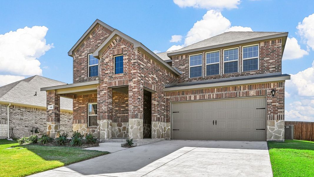 Representative exterior photo of a completed home built from the OZARK by D.R. Horton in Northspur, Forney, TX (Image 2). Representative exterior photo of a completed home built from the OZARK by D.R. Horton in Northspur, Forney, TX (Image 2).