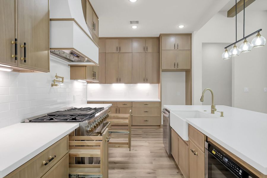 Smartly designed cabinets keep things neat and tidy….and handy!