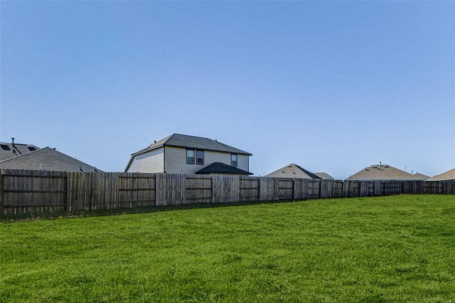 Exterior details and patio area of a home in , Baytown (Image 4).