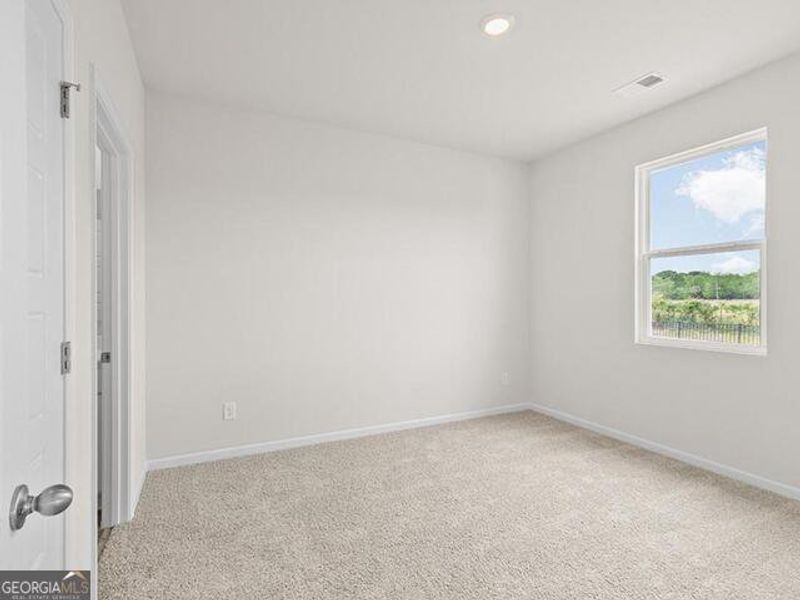 Spacious, unfurnished interior of a new home in Remington Chase, Perry (Image 25).