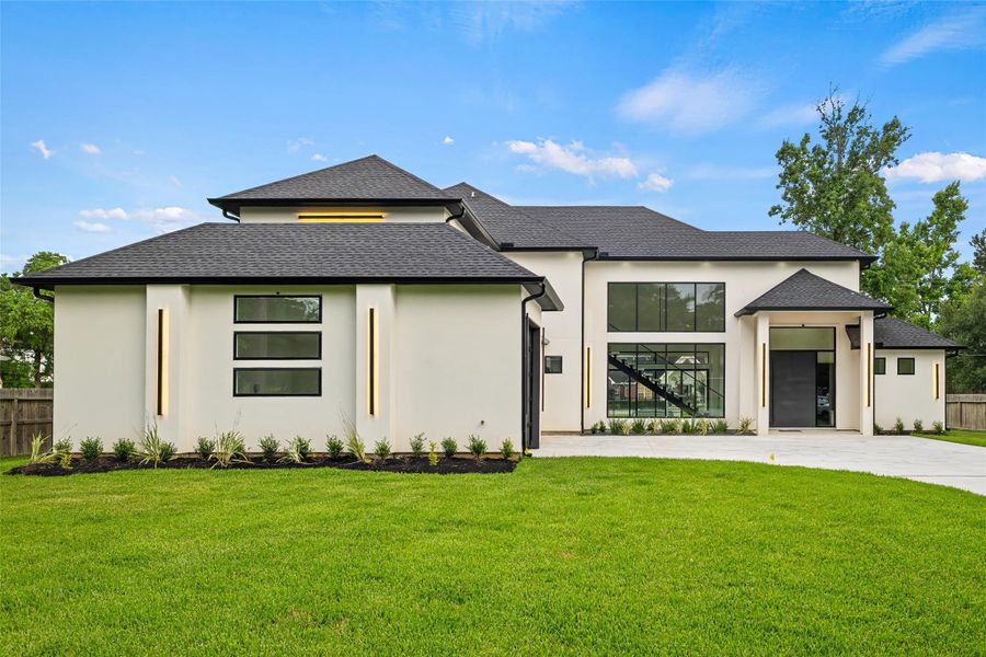 Front exterior of a new home in , Magnolia, TX, highlighting curb appeal (Image 26). Front exterior of a new home in , Magnolia, TX, highlighting curb appeal (Image 26).