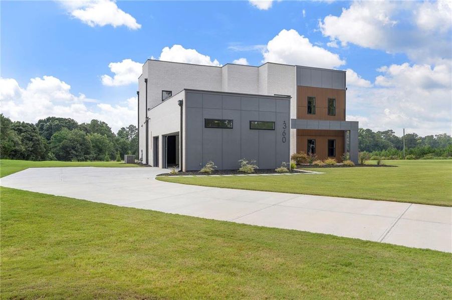 Front exterior of a new home in , McDonough, GA, highlighting curb appeal (Image 31).