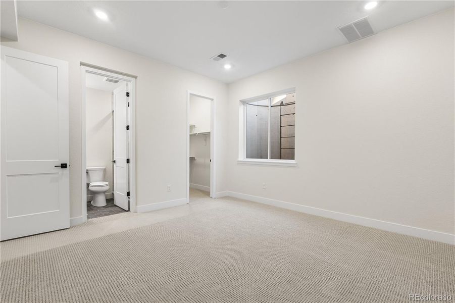 Spacious, unfurnished interior of a new home in Autograph at Lyric, Lone Tree (Image 27).