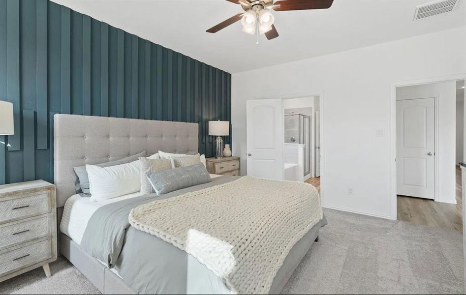 Example of primary bedroom w king size bed