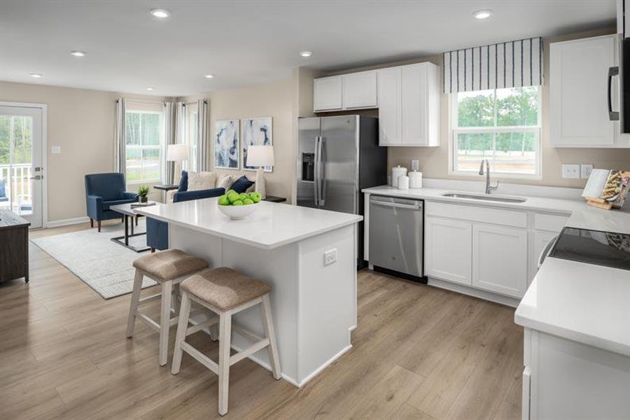 Furnished interior view inside a new home in Highland Park Condos, White House (Image 4). Furnished interior view inside a new home in Highland Park Condos, White House (Image 4).