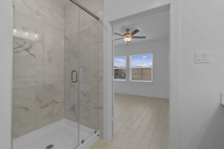 Image 39 representing the Chalet by Chesmar Homes in Meridiana Townhomes, Iowa Colony, TX.