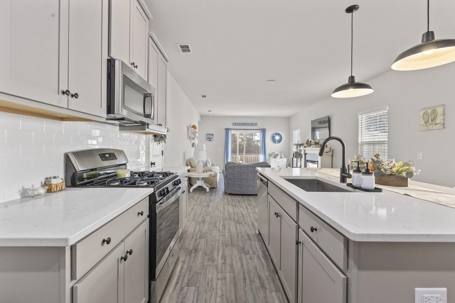 Furnished interior view inside a new home in K. Hovnanian's® Four Seasons at Lakes of Cane Bay, Summerville (Image 9). Furnished interior view inside a new home in K. Hovnanian's® Four Seasons at Lakes of Cane Bay, Summerville (Image 9).