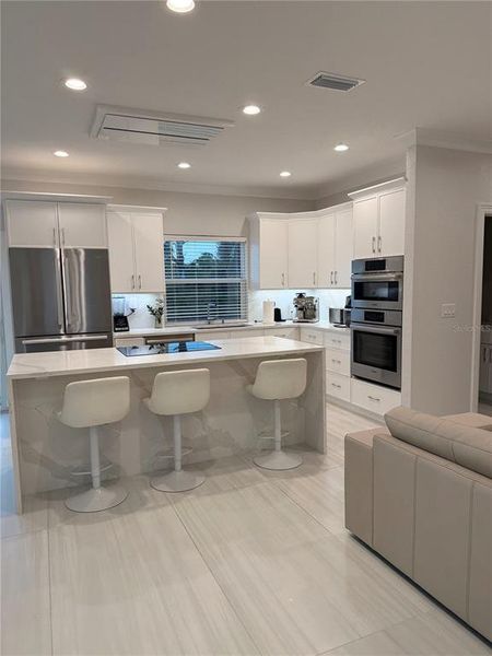 Furnished interior view inside a new home in , Port Charlotte (Image 11).
