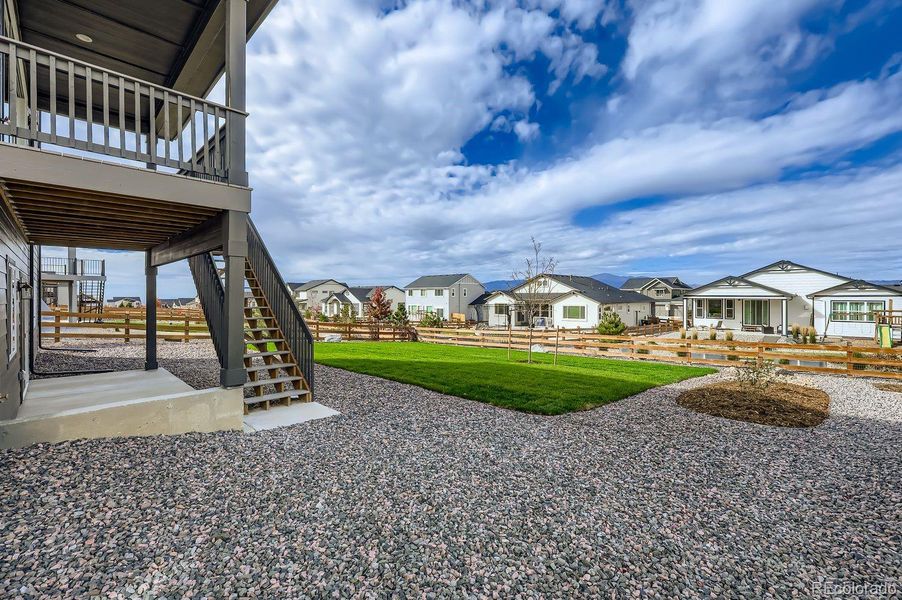 Exterior details and patio area of a home in Timber Ridge, Colorado Springs (Image 16).