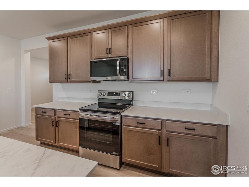 Furnished interior view inside a new home in Bloom Trailblazer Collection - Single Family Homes, Fort Collins (Image 10).