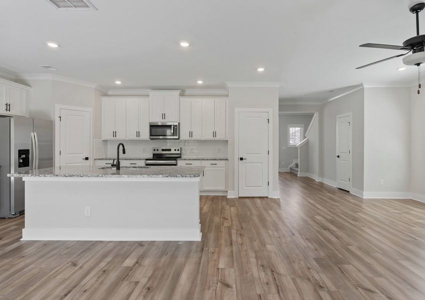 The kitchen overlooks the dining area