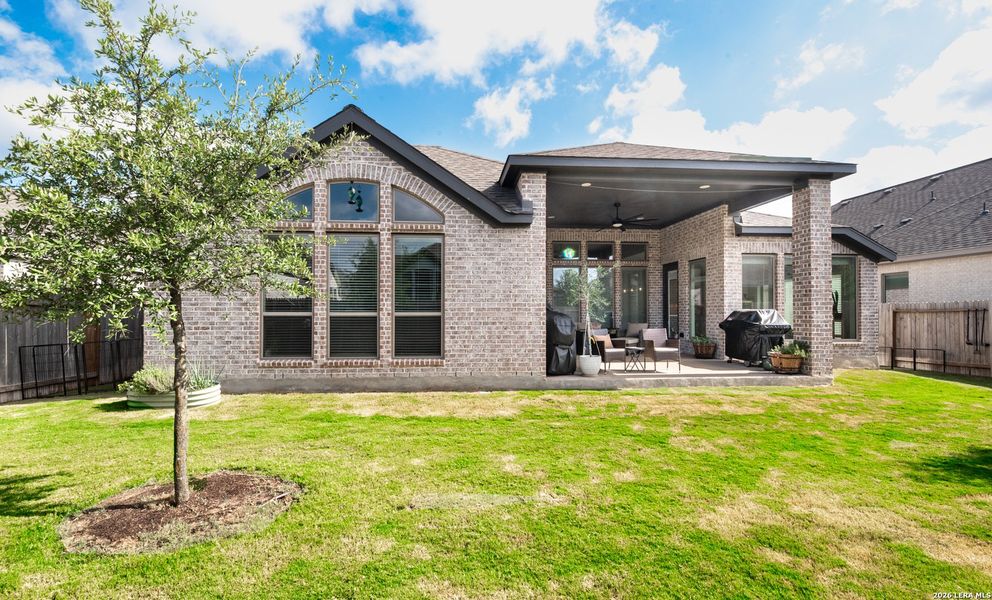 Exterior details and patio area of a home in Meadows of Mill Creek, Seguin (Image 26).