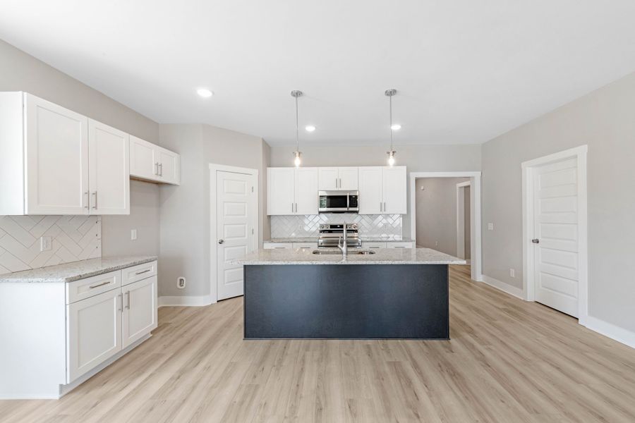 Representative furnished interior of a home built from the One Story Farmhouse by Norfleet Builders in Cambria, White House (Image 6).