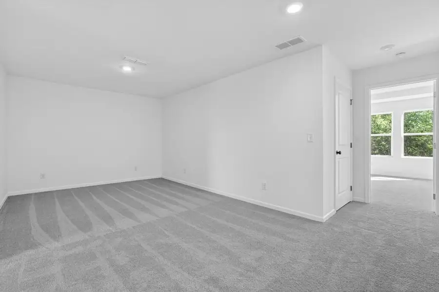 Spacious, unfurnished interior of a new home in Weatherfield, Buford (Image 29).