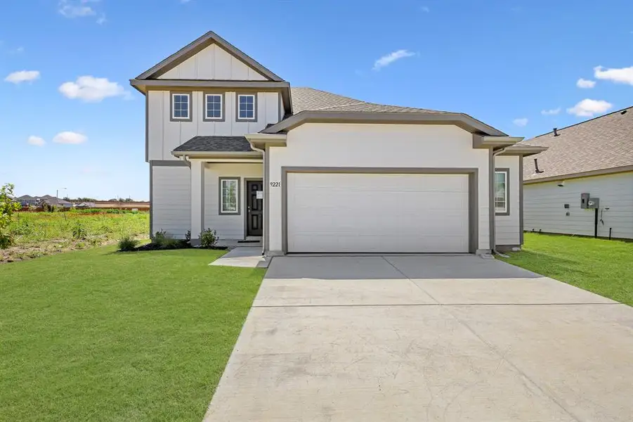 Front exterior of a new home in Rocky Creek Crossing, Fort Worth, TX, highlighting curb appeal (Image 15).