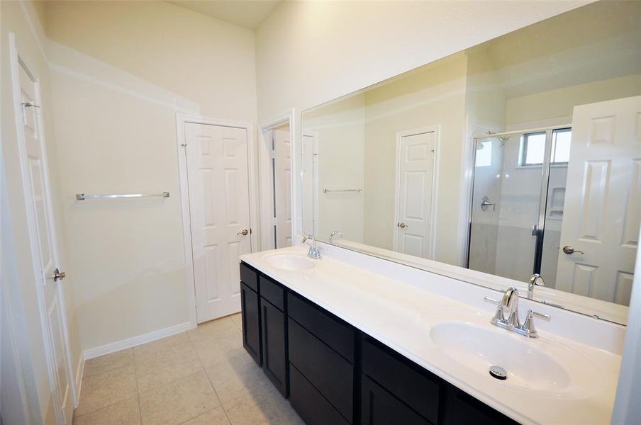 Master Bath includes dual vanities.