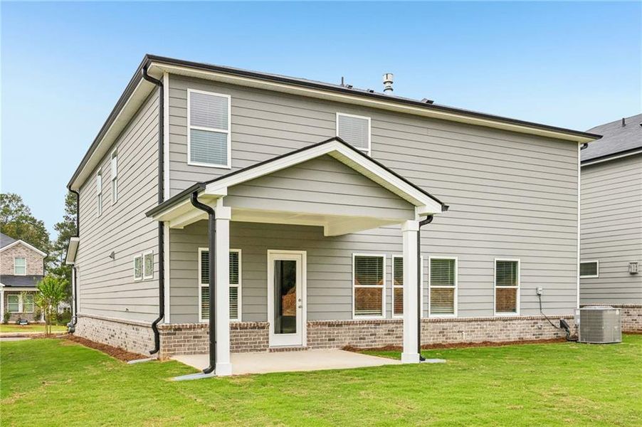 Exterior details and patio area of a home in Westmont Preserve, Powder Springs (Image 32).