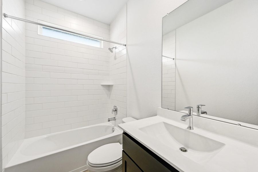 Furnished interior view inside a new home in Hills of Westlake, Conroe (Image 8).