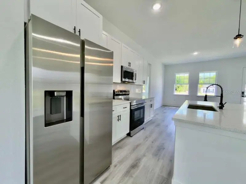 Furnished interior view inside a new home in , Ocala (Image 5).