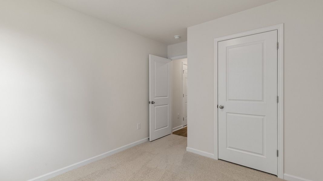 Spacious, unfurnished interior of a new home in Collett Farm, Trinity (Image 15). Spacious, unfurnished interior of a new home in Collett Farm, Trinity (Image 15).
