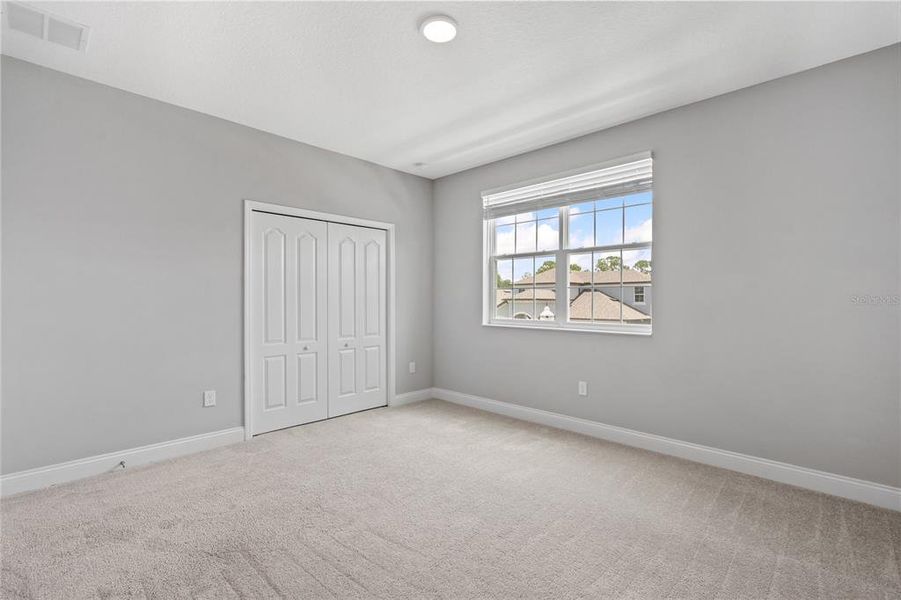 Spacious, unfurnished interior of a new home in Encore at Ovation, Winter Garden (Image 35).