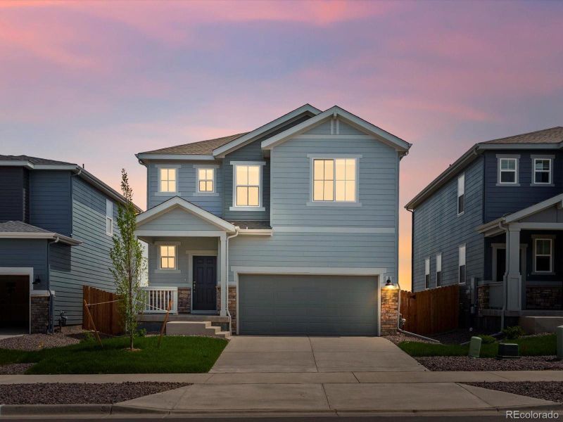 Front exterior of a new home in Lake Bluff, Greeley, CO, highlighting curb appeal (Image 18).