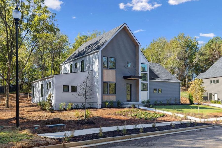 Front exterior of a new home in Aster, Roswell, GA, highlighting curb appeal (Image 28).