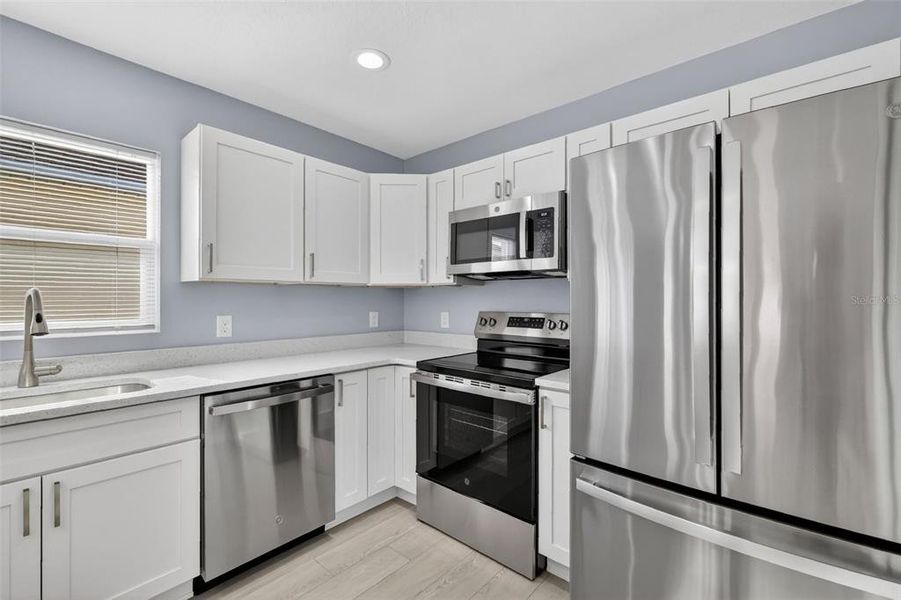 Furnished interior view inside a new home in , The Villages (Image 9).