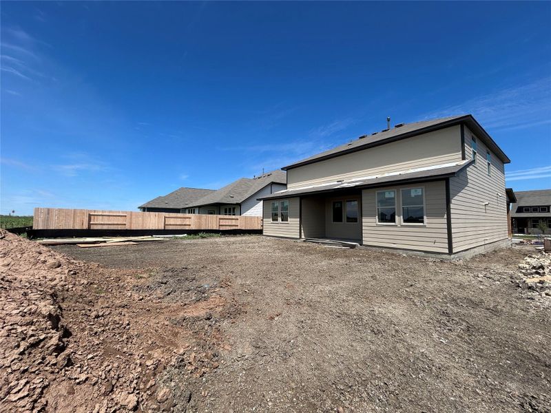 Exterior details and patio area of a home in Willow Springs, Buda (Image 3).