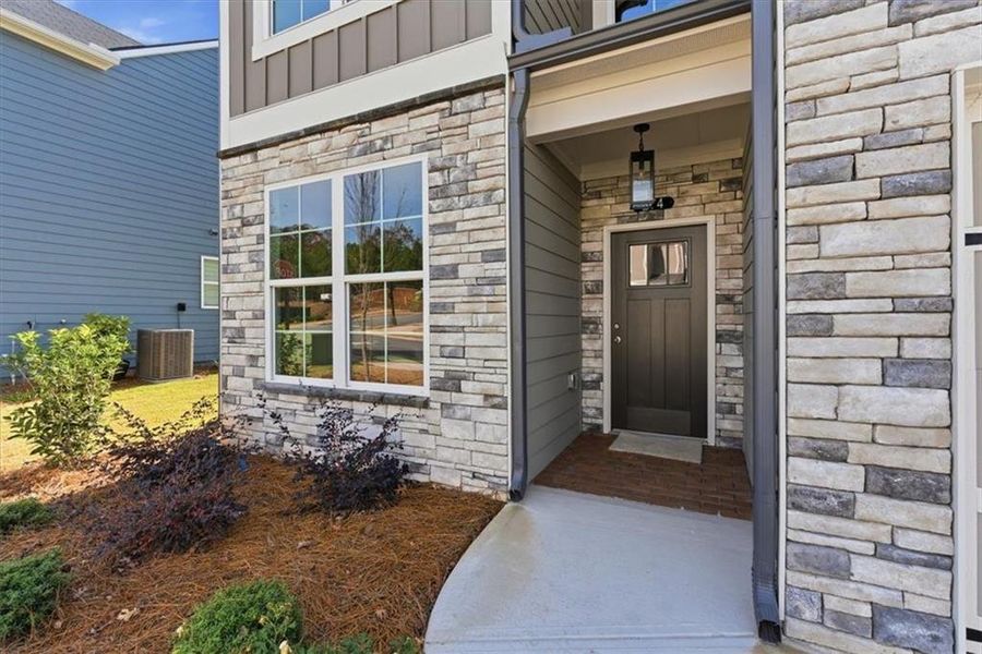 Exterior details and patio area of a home in Lakeside at Great Sky, Canton (Image 3).