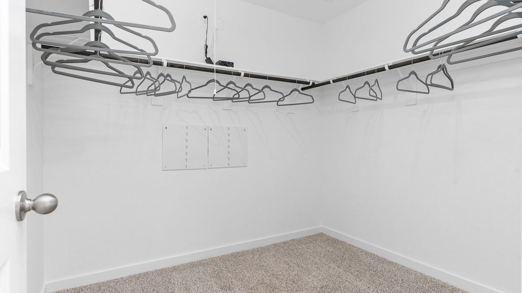 Spacious, unfurnished interior of a new home in Caldwell Crossing, Iowa Colony (Image 20).