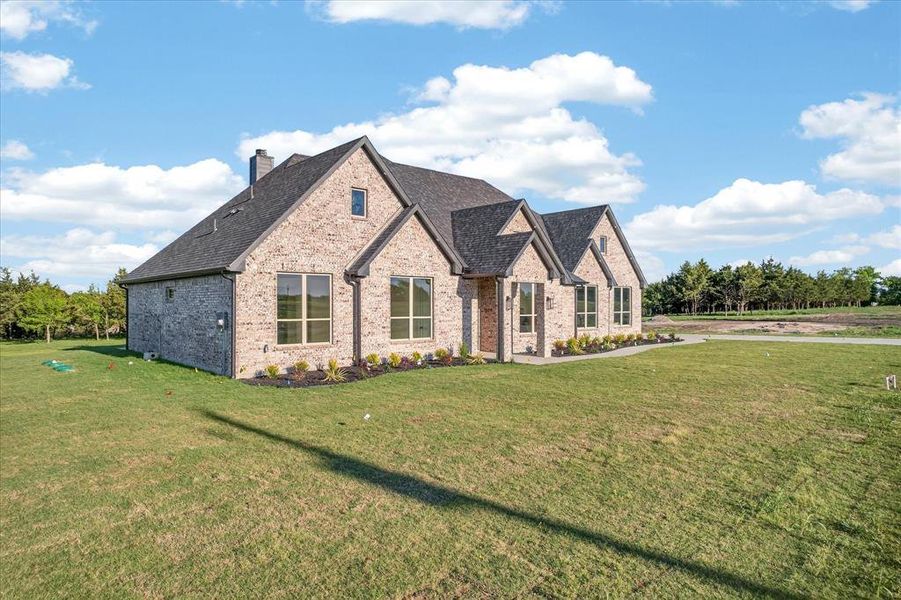 Front exterior of a new home in , Celeste, TX, highlighting curb appeal (Image 28).