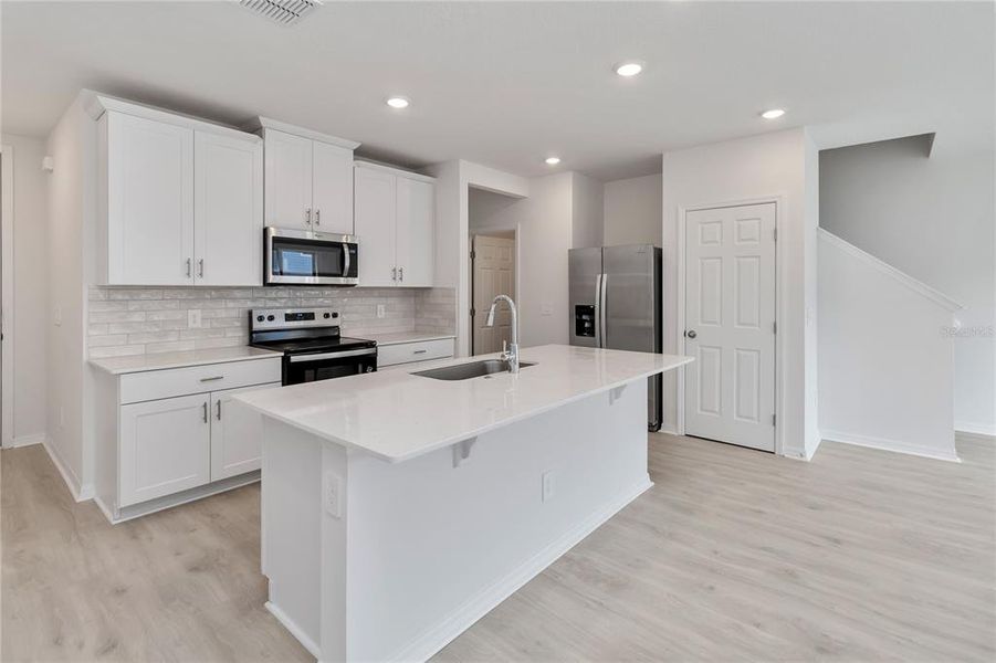 Furnished interior view inside a new home in , St. Cloud (Image 10).