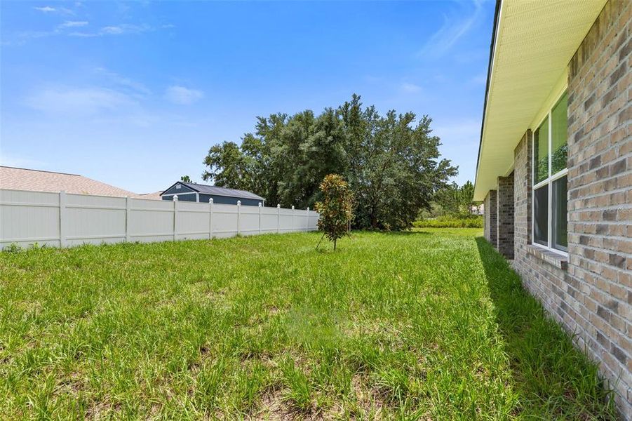 Exterior details and patio area of a home in , Palm Coast (Image 36).