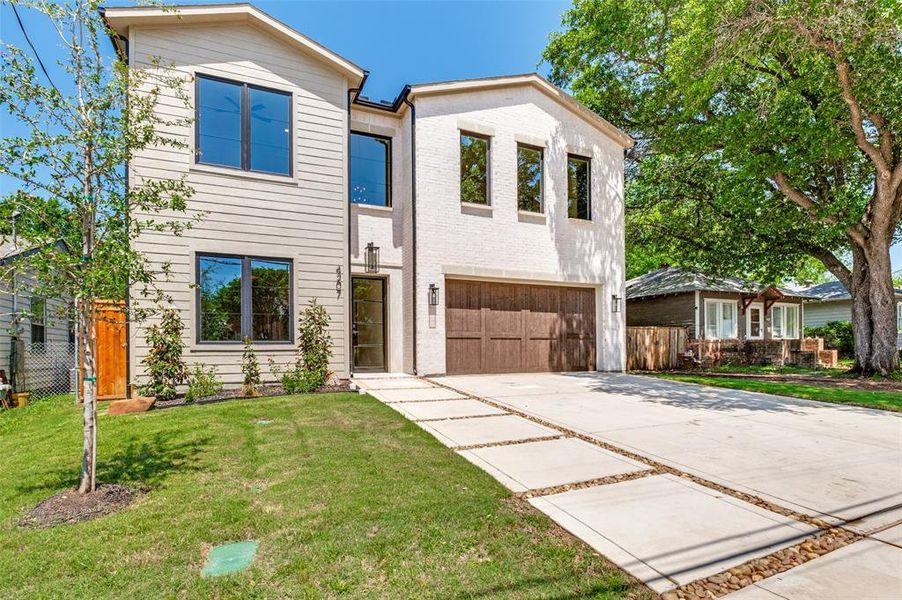Front exterior of a new home in , Dallas, TX, highlighting curb appeal (Image 1). Front exterior of a new home in , Dallas, TX, highlighting curb appeal (Image 1).