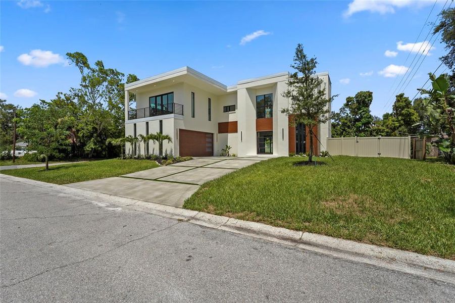Front exterior of a new home in , Sarasota, FL, highlighting curb appeal (Image 28).