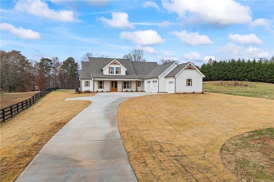 Front exterior of a new home in , Gainesville, GA, highlighting curb appeal (Image 1).