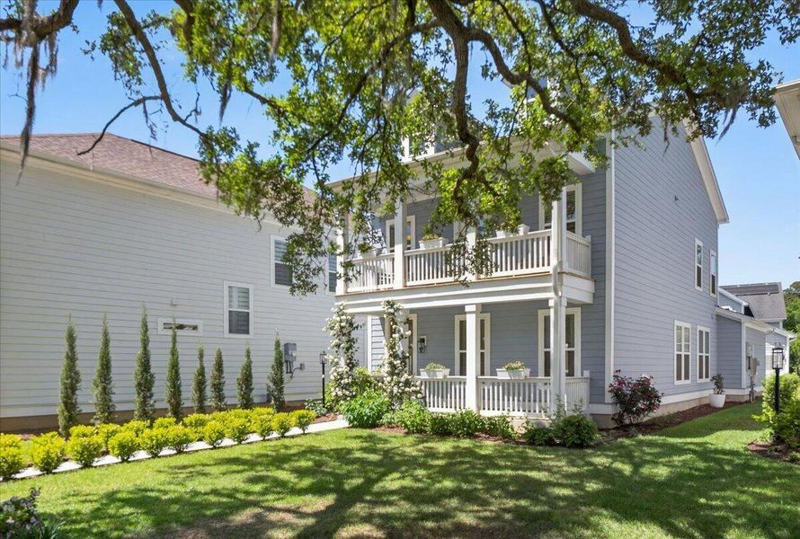 Exterior details and patio area of a home in Oak Bluff, Charleston (Image 29).