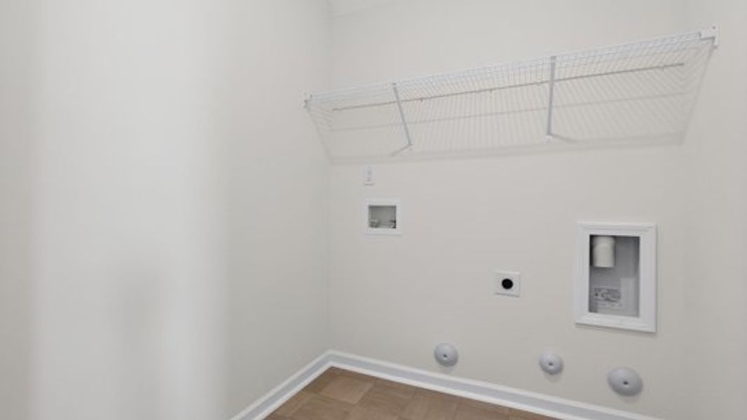 Spacious, unfurnished interior of a new home in Shahbain Reserve, Raeford (Image 22).