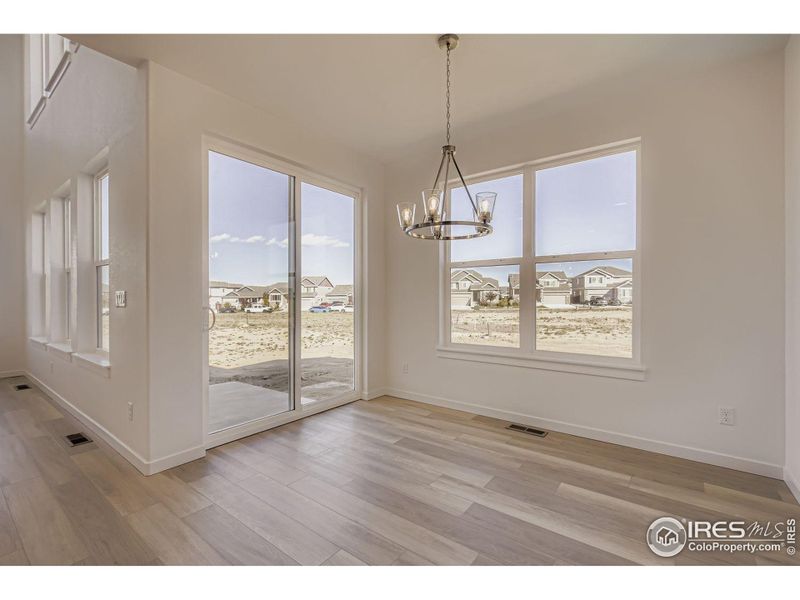 Spacious, unfurnished interior of a new home in RainDance - 60s, Windsor (Image 16).